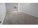 Neutral bedroom featuring plush carpeting and a sun-filled window at 2756 Palmview Sw Ct, Atlanta, GA 30331