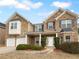 Two story brick home with a two car garage and manicured lawn at 2756 Palmview Sw Ct, Atlanta, GA 30331