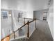 Bright open foyer featuring stairs and wood and iron railing at 2756 Palmview Sw Ct, Atlanta, GA 30331