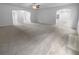 Spacious living room boasts an open floor plan and ceiling fan at 2756 Palmview Sw Ct, Atlanta, GA 30331