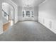 Spacious living room with a decorative bay window and crown molding, offering natural light at 2756 Palmview Sw Ct, Atlanta, GA 30331