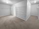 Spacious walk-in closet features custom shelving and ample storage space at 2756 Palmview Sw Ct, Atlanta, GA 30331