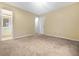Spacious bedroom with carpet and access to bathroom at 1089 Brittwood Pl, Norcross, GA 30093