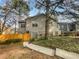 Gray house with a wooden fence and walkway at 1089 Brittwood Pl, Norcross, GA 30093