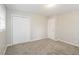 Bedroom with neutral wall paint and carpet flooring at 1381 High Meadow Dr, Stone Mountain, GA 30083