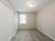 Bright bedroom with neutral walls and carpet, featuring a large closet at 1381 High Meadow Dr, Stone Mountain, GA 30083