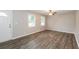 Spacious living room featuring hardwood floors and neutral-toned walls at 1381 High Meadow Dr, Stone Mountain, GA 30083