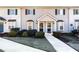 Townhouse exterior with well-maintained landscaping, featuring a sidewalk and a bay window at 1625 Conley Rd # 270, Conley, GA 30288