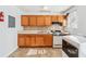 Kitchen featuring tile backsplash and stove at 1625 Conley Rd # 270, Conley, GA 30288