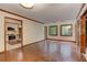 Living area with brick floors, white walls, and views to the outside at 4259 Arbor Club Dr, Marietta, GA 30066