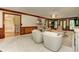 Spacious living room with wood trim, plush furniture, an open layout, and abundant natural light from the outdoors at 4259 Arbor Club Dr, Marietta, GA 30066