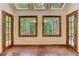 Sun room with brick floors, windows, and natural light at 4259 Arbor Club Dr, Marietta, GA 30066