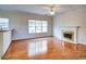 Gathering room featuring hardwood floors and a fireplace at 1728 Brandon Lee Sw Way, Marietta, GA 30008