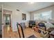 Bedroom features hardwood floors, and a window with blinds at 3710 Lynn Dr # A & B, Powder Springs, GA 30127