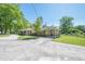Single-story brick home with a large backyard and covered patio at 3710 Lynn Dr # A & B, Powder Springs, GA 30127