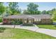 Charming brick home with a cozy front porch and manicured landscaping at 3710 Lynn Dr # A & B, Powder Springs, GA 30127