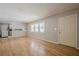 Bright living area featuring hardwood floors, neutral walls, and ample natural light at 3710 Lynn Dr # A & B, Powder Springs, GA 30127