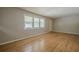 Bright living room with hardwood floors, neutral paint, and multiple windows at 3710 Lynn Dr # A & B, Powder Springs, GA 30127