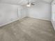 Spacious carpeted bedroom with an ensuite bathroom at 7085 Magnolia Ln, Fairburn, GA 30213