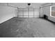 Spacious two-car garage with open floor plan at 7085 Magnolia Ln, Fairburn, GA 30213