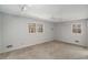 Spacious bedroom with neutral walls and carpet at 75 Azalea Trl, Carrollton, GA 30116