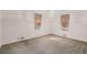 Spacious bedroom with neutral walls, carpet, and window at 75 Azalea Trl, Carrollton, GA 30116