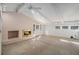 Spacious living room featuring a brick fireplace and vaulted ceiling at 75 Azalea Trl, Carrollton, GA 30116