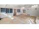 Bright living area with built-in shelving and hardwood floors at 75 Azalea Trl, Carrollton, GA 30116