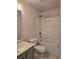 Bathroom featuring a bathtub, toilet and vanity at 1455 Weeping Tree Cir, Auburn, GA 30011