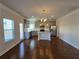 Modern kitchen with stainless steel appliances and granite countertops at 1455 Weeping Tree Cir, Auburn, GA 30011