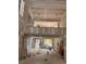 Two-story great room with large windows, lots of natural light, and unfinished drywall at 3336 Ferncliff Ne Pl, Atlanta, GA 30324