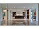 Sleek, modern kitchen with a large island, stainless steel appliances, and marble countertops at 3336 Ferncliff Ne Pl, Atlanta, GA 30324
