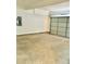 Attached garage with concrete floor at 4405 Belcamp, Fairburn, GA 30213