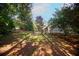 Spacious, partially fenced backyard with wooded area at 1039 Ola Dale Dr, Mcdonough, GA 30252