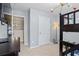 Bedroom with bunk beds and access to a hallway at 8785 Seneca Rd, Palmetto, GA 30268