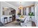 Dining area with modern light fixture and kitchen view at 8785 Seneca Rd, Palmetto, GA 30268