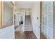 Bright entryway with hardwood floors and staircase at 8785 Seneca Rd, Palmetto, GA 30268