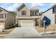 Two-story brick home with attached garage and driveway at 8785 Seneca Rd, Palmetto, GA 30268