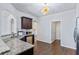 Modern kitchen with granite countertops and breakfast bar at 8785 Seneca Rd, Palmetto, GA 30268