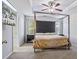 Main bedroom with a large bed and plenty of natural light at 8785 Seneca Rd, Palmetto, GA 30268