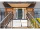 Building entrance with steps and black railings at 365 Winding River Dr # E, Atlanta, GA 30350