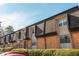 Brick building exterior with dark brown roof and landscaping at 365 Winding River Dr # E, Atlanta, GA 30350