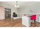 Dining room with hardwood floors, massage chair, and access to patio at 365 Winding River Dr # E, Atlanta, GA 30350