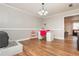 Dining room features hardwood floors and a chic workspace setup at 365 Winding River Dr # E, Atlanta, GA 30350