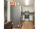 Kitchen with stainless steel appliances and wood-look flooring at 365 Winding River Dr # E, Atlanta, GA 30350