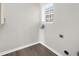 Laundry room with vinyl flooring and window at 330 Pinehurst Way, Canton, GA 30114