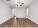 Bright living room with hardwood floors and neutral walls at 5591 Hislop Ln # 76, Mableton, GA 30126