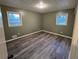 Spacious bedroom with new flooring and neutral walls at 5737 Lorraine Dr, Stone Mountain, GA 30087