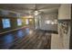 Open living area with hardwood floors and fireplace at 5737 Lorraine Dr, Stone Mountain, GA 30087