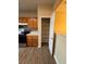 Kitchen with wooden cabinets and stainless steel appliances at 125 Odyssey Turn, Conyers, GA 30012